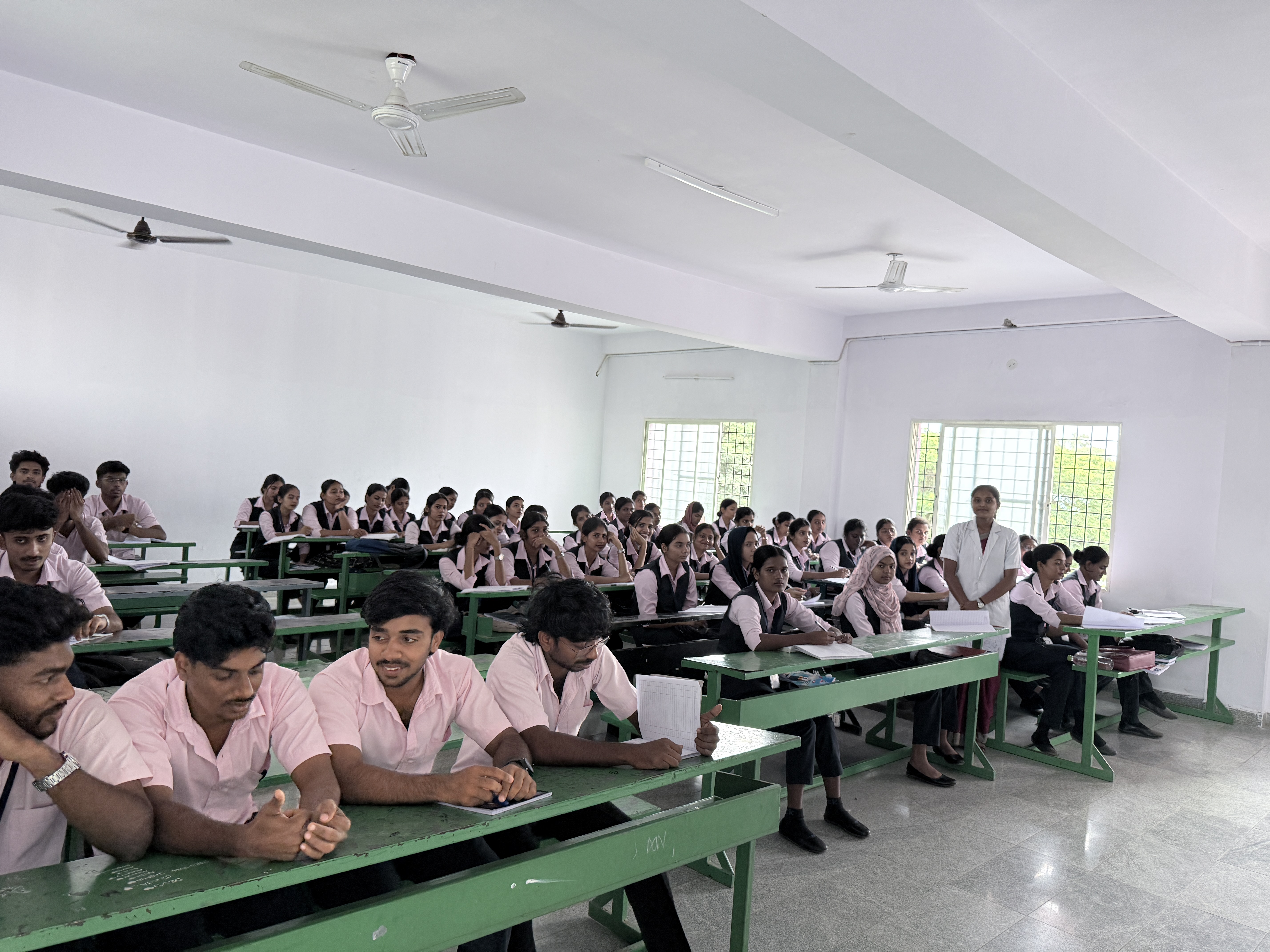 Group of students sitting together outdoors